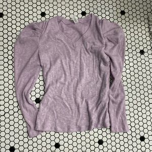 It’s puffy shoulder long  sleeve top size large